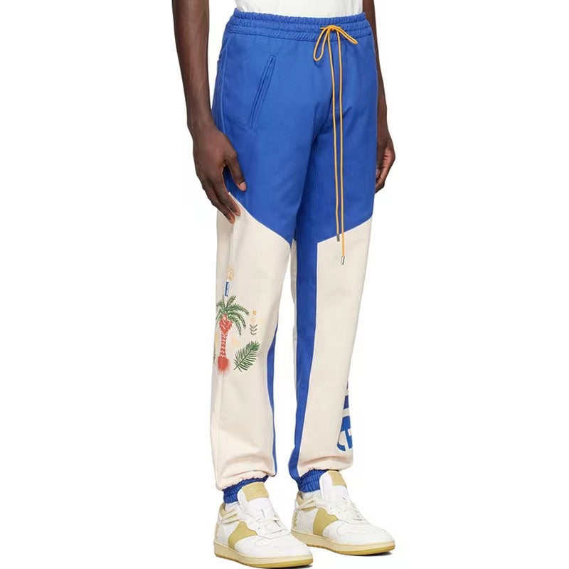 RHUDE Coconut tree and peace dove print stitching contrast color pants